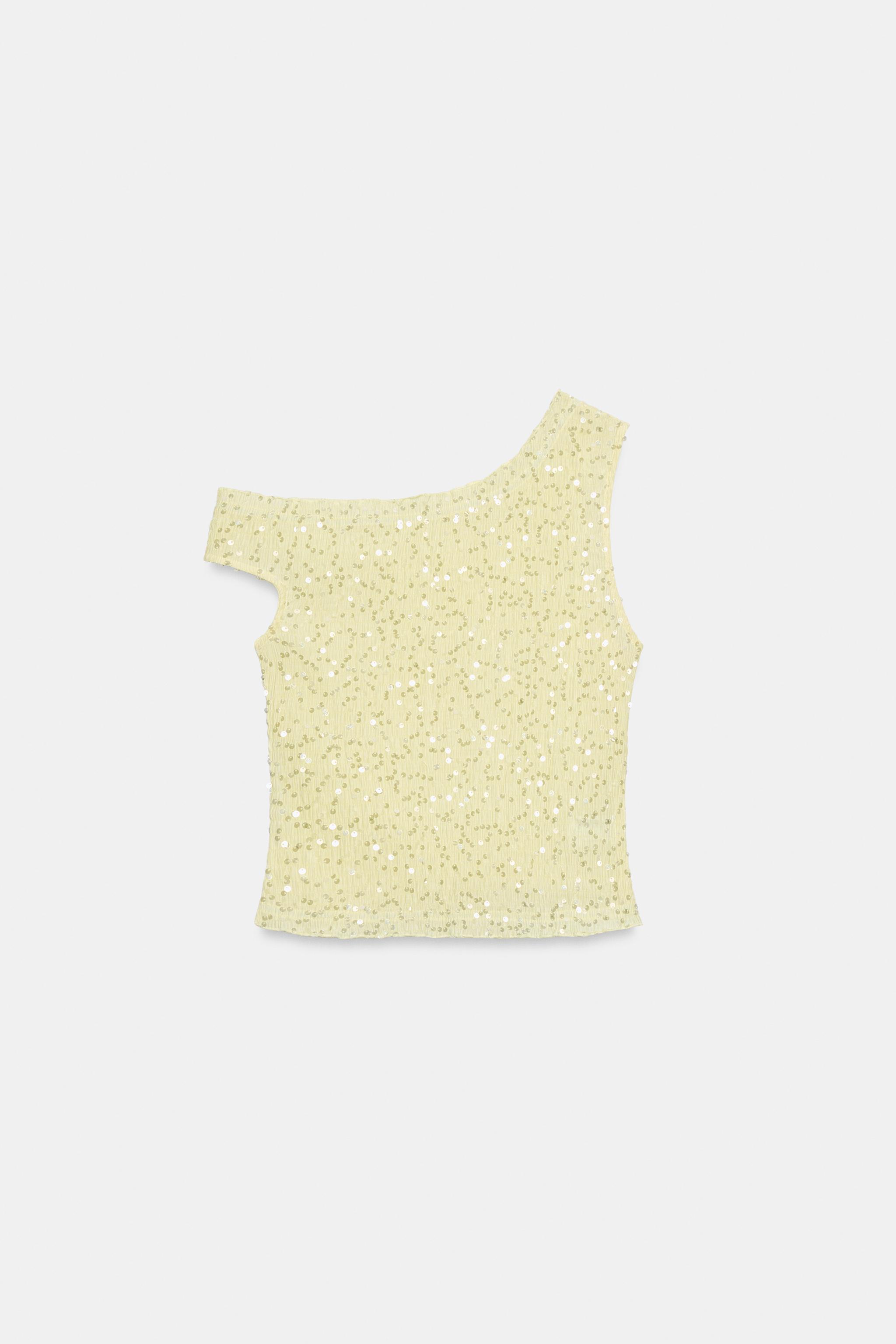 TOP ASYMÉTRIQUE À PAILLETTES